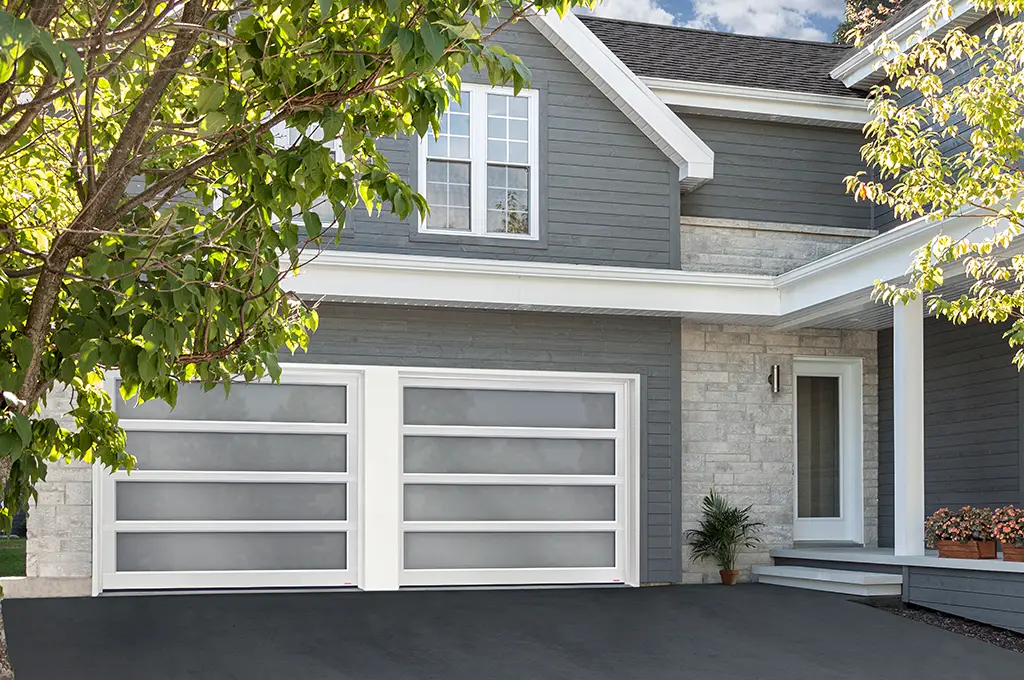 A close look at a California full-view door in 9' x 7', White aluminum frame, White Sandblasted glass.
