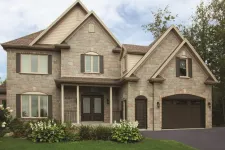 This is a Prestige XL design garage door, here shown in single size, Chocolate Walnut color, with Pinhead windows.