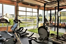 This full-view garage door is in the California design, 12' x 10' with an anodized aluminum frame.