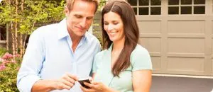 Couple looking at their phone