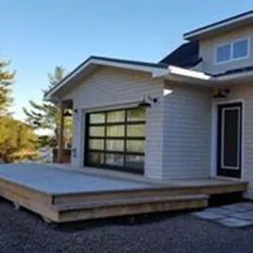 a patio with a garage door