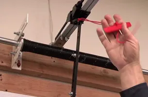 someone opening a garage door manually