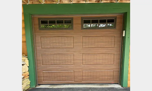 Acadia 138 North Hatley LP garage door, 9' x 7', Chocolate Walnut Faux Wood, Clear windows with Richmond decorative insert