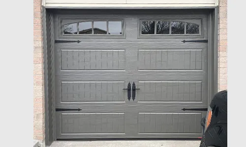 North Hatley LP garage door, Dark Sand, windows with Richmond Arch Long Inserts