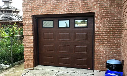 Standard+ Classic CC garage door, 8' x 7', American Walnut, Clear windows