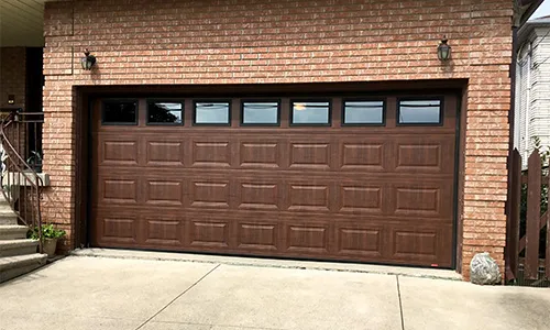 Standard+ Classic CC garage door, 16' x 21', American Walnut, Clear windows