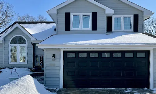 Gray vinyl house with Classic CC garage door, 16' x 7', Black, White Sandblasted windows