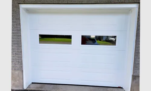 Standard+ Classic XL garage door, 9' x 7', Ice White, Clear windows