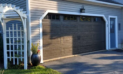 Acadia 138 North Hatley LP garage door, 16' x 7', Moka Brown, windows with Richmond Inserts